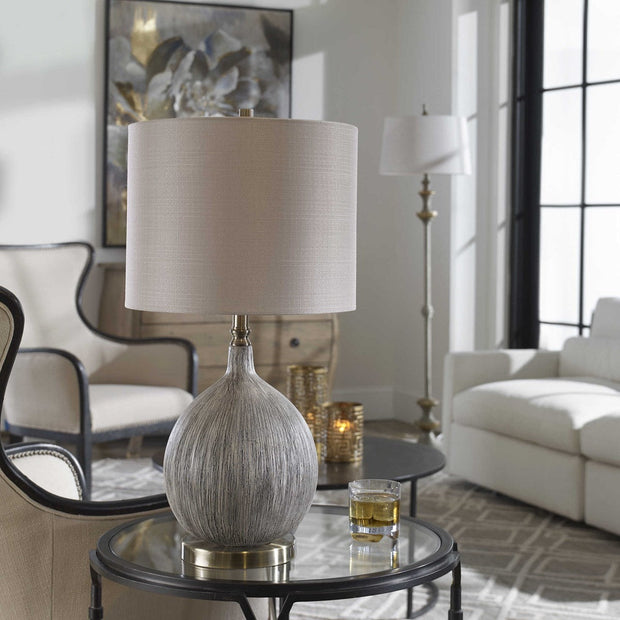 Uttermost Hedera Ivory and Aged Black Ceramic Table Lamp With Light Beige Linen Shade