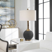 Uttermost Arnav Matte Black and Golden Bronze Table Lamp With Light Gray Linen Drum Shade