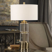 Uttermost Vaiga Antique Brass and Clear Glass Table Lamp With White Linen Shade