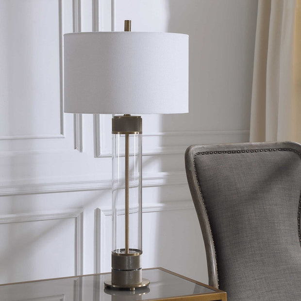 Uttermost Anmer Clear Glass and Antiqued Brass Iron Table Lamp With White Drum Shade