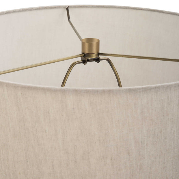 Uttermost Gravitas Ivory Stone and Brushed Brass Table Lamp With Beige Linen Shade
