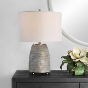 Uttermost Gorda Textured Bronze and Green Patina CeramicTable Lamp With Beige Linen Shade