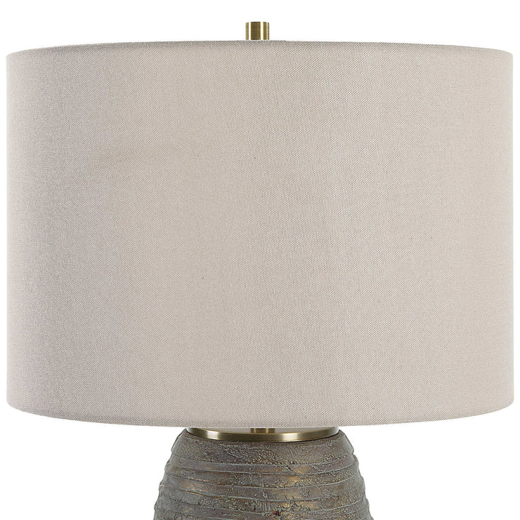 Uttermost Gorda Textured Bronze and Green Patina CeramicTable Lamp With Beige Linen Shade