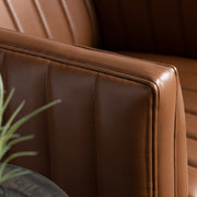 Crestview Collection Huxley Cognac Faux Leather Channeled Accent Chair