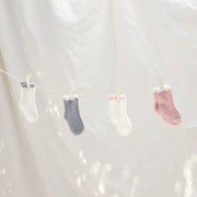 Kashwere Baby Ultra Plush Maliblu and Creme Set of Two Baby Sock Sets