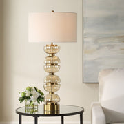 Uttermost Assemble Light Amber Glass Table Lamp With White Linen Shade
