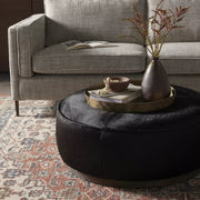 Four Hands Sinclair Large Round Ottoman ~ Black Hair on Hide Leather